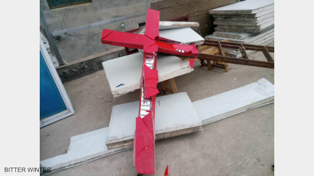 The demolished church cross