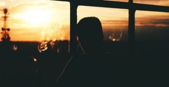 Man looking at sunset (taken from the Internet)