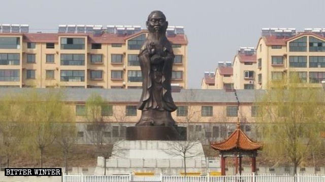 The converted hybrid statue with the body of Guanyin and the head of Confucius