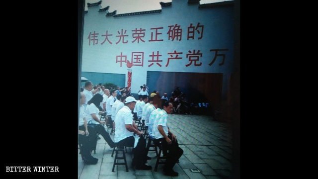 A poster reading “Long live the great, glorious and correct Chinese Communist Party”