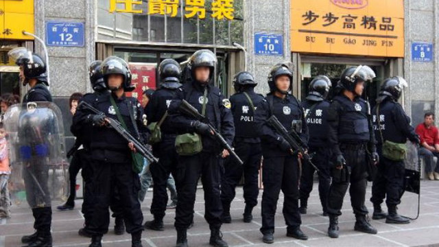Special police in a street of Xinjiang