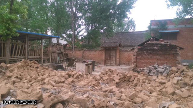 The house of an impoverished family in Neixiang county’s Guanzhang town in the central province of Henan was demolished as part of the poverty alleviation campaign.