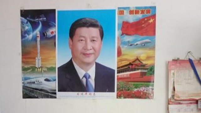 An impoverished Christian was forced to hang a portrait of Xi Jinping in his home.