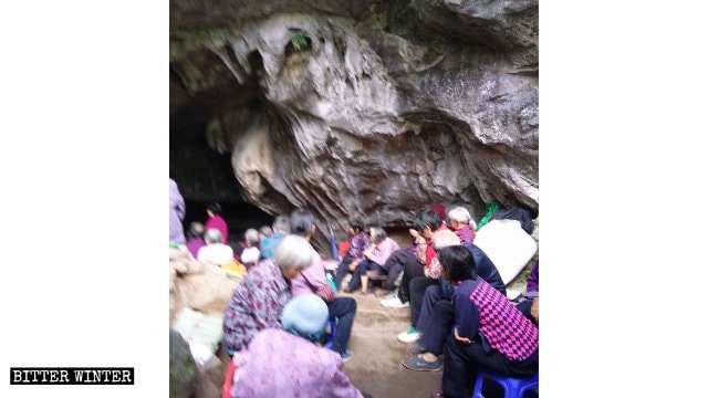 Elderly believers gathering in a cave.