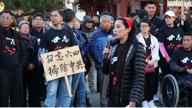 Rose Tang hosting a Tiananmen candlelight vigil. Chinatown, San Francisco, June, 2018, The 29th anniversary of Tiananmen.