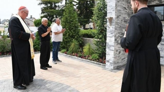 Cardinal Dolan in Staten Island after the attack. From Twitter.