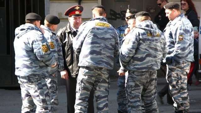 OMON special police agents. Credits.