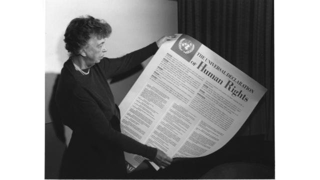 Former U.S. First Lady Eleanor Roosevelt (1884–1962) holding the official English-language copy of the Universal Declaration of Human Rights, adopted in 1948. Credits.
