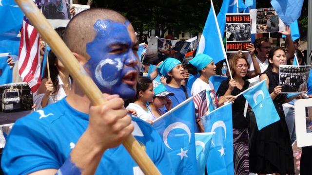 On July 10, 2009, Uyghurs protested and denounced the massacre in Washington DC. Credits.