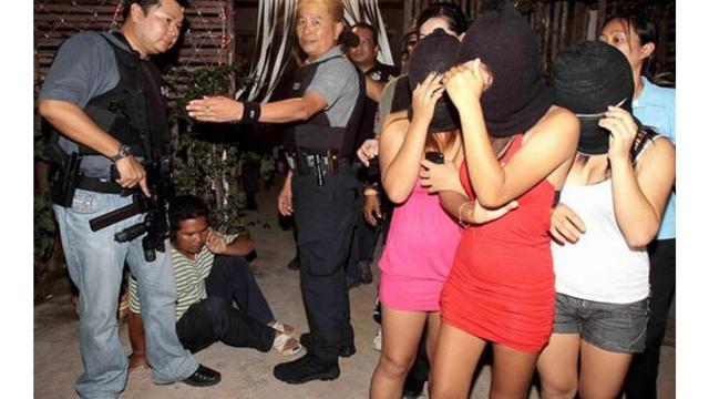 Police cracking down on a minor prostitution operation in Laos. From Twitter.