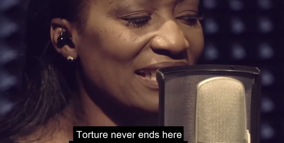 Della Miles singing “East Turkistan.” Screenshot.