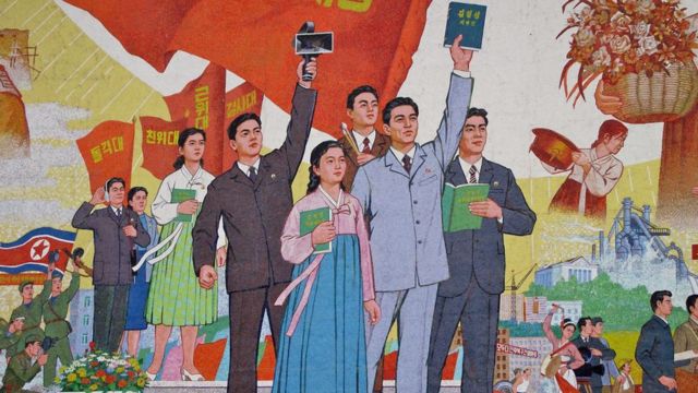 Propaganda mural in North Korea. Credits.