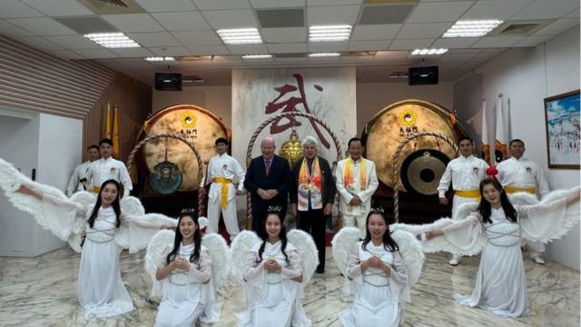 Massimo Introvigne, Eileen Barker, and Dr. Hong with the Tai Ji Men Angels, who performed after the Bell ringing ceremony