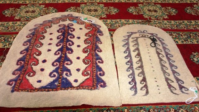 Prayer rugs inside a mosque in the village of Nohur, Turkmenistan. Credits.