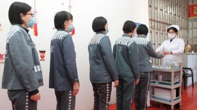 Inmates of the Heilongjiang Provincial Women’s Prison in a Chinese propaganda video. Screenshot.