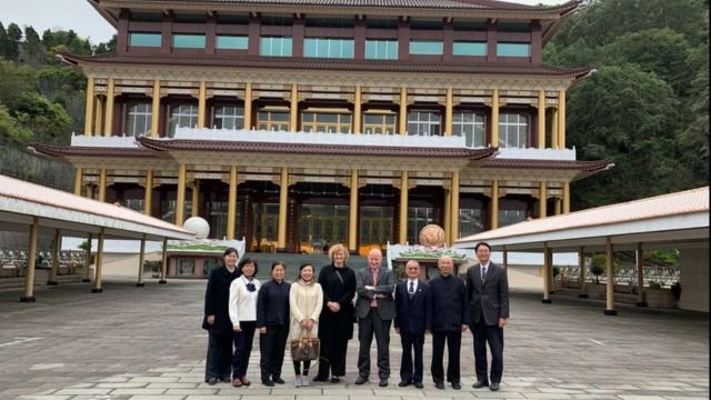 Massimo Introvigne and Rosita Šorytė (in the center) with Yiguandao devotees at their Taoyuan temple in Taiwan. 
