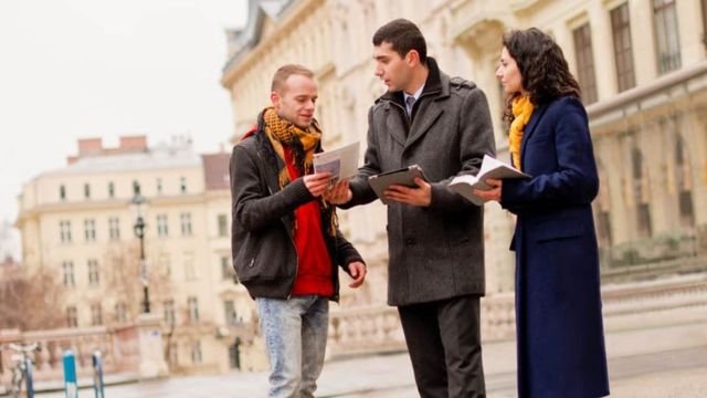 Jehovah’s Witnesses sharing their faith. Source: JW.org.
