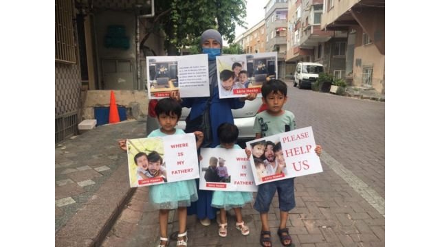 One of the many family protests in Istanbul pleading for the release of their father.Back row, mother, Zeynure, and front row, Idris’ three children, Nefise, Uyghuray annd Abdulkerim asking for help to bring their father home. Photo credit: Zeynure Wubuli.