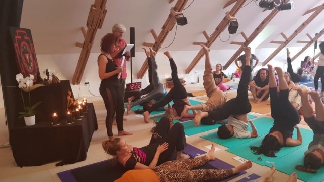 Adina Stoian lecturing at a retreat. From Facebook.