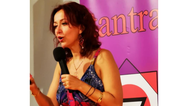 Adina Stoian teaching a Tantric course. From Facebook.