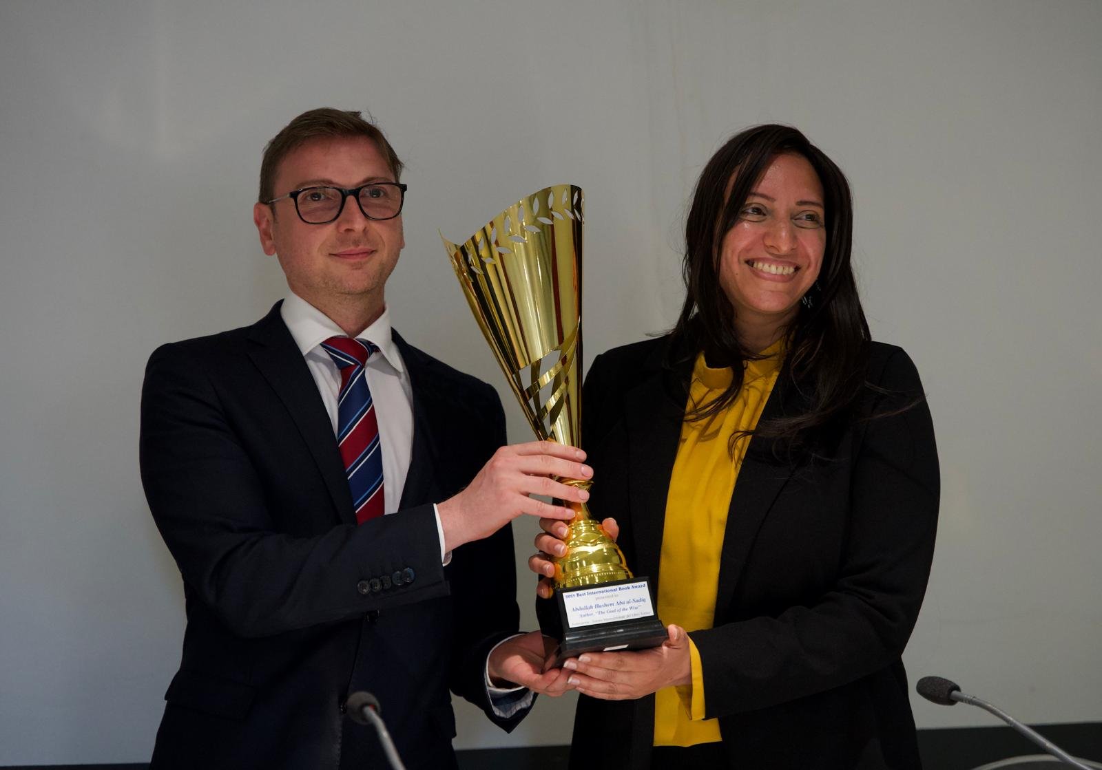 Aria Razfar and Hadil el-Khouly during the award ceremony.