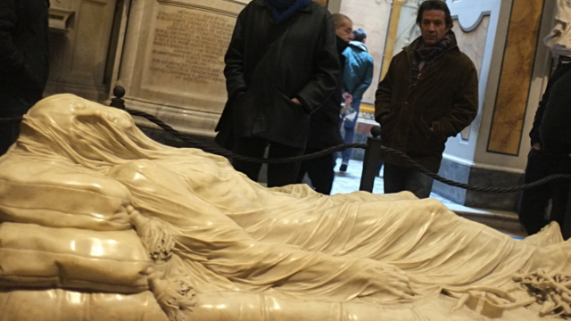 Visitors to the Cappella Sansevero in Naples contemplate the possible meanings of “The Veiled Christ,” sculpted by Giuseppe Sanmartino (1720–1793) for Raimondo di Sangro (1710–1771). Credits.