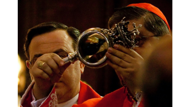 Then Archbishop of Naples, Cardinal Crescenzio Sepe, presides over the liquefaction of the blood of Saint Januarius in 2009. Credits.