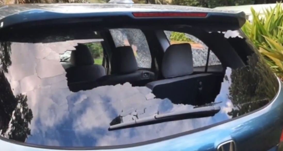 Love Has Won’s car vandalized by violent anti-cult protesters in Hawaii. Screenshot.