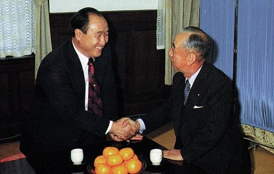 Reverend Sun Myung Moon (1920–2012) with Nobusuke Kishi (1896–1987).