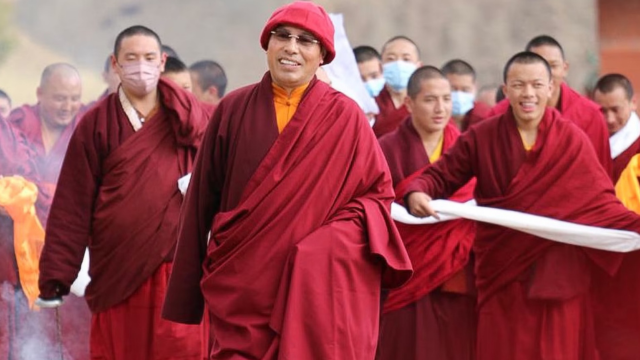 Lama Humkar Dorje Rinpoche with followers. Source: Radio Free Asia.