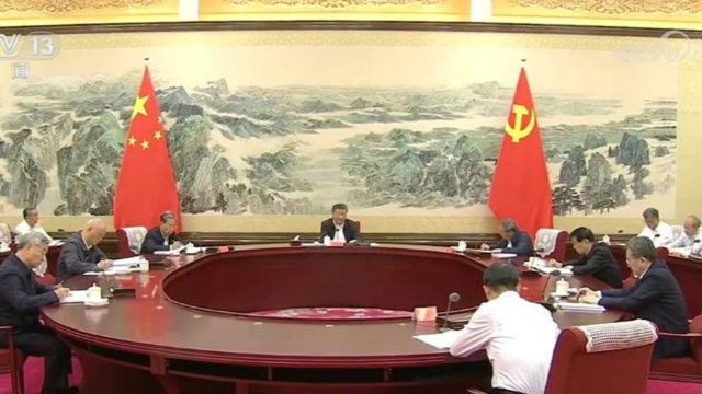 Xi presiding the special meeting. Screenshot.