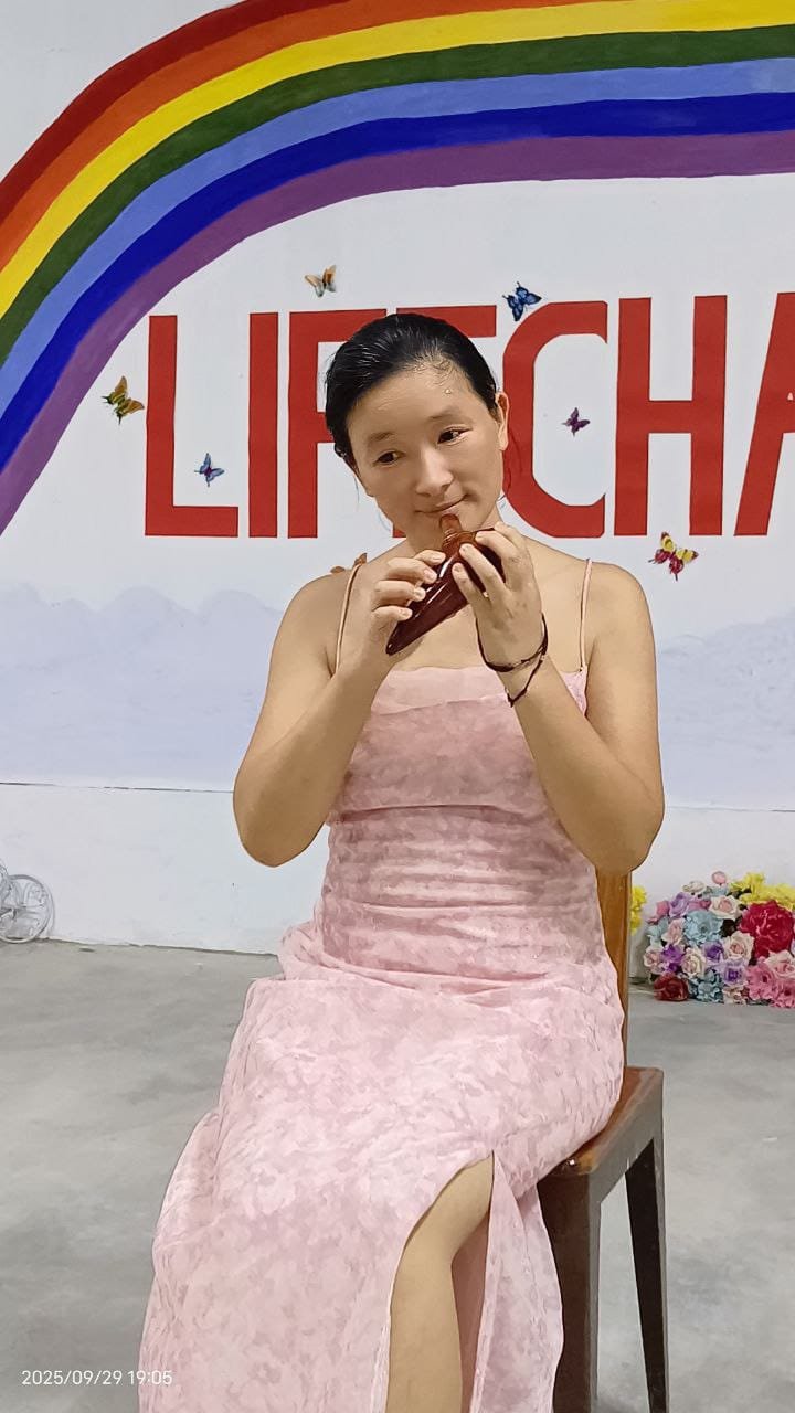 A Celestial playing the ocarina (with considerable skill).