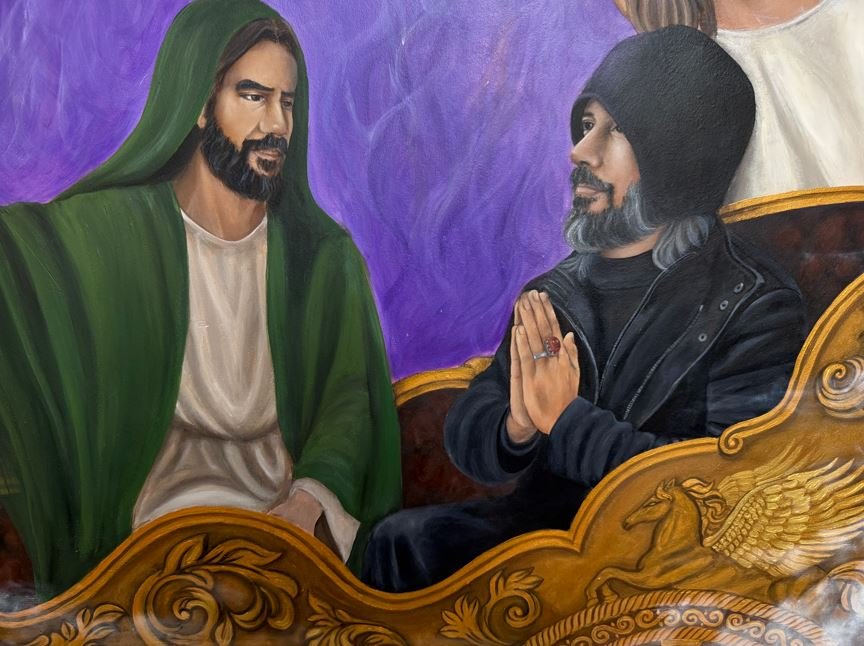 An idealized portrait of Abdullah Hashem (right) with Ahmed al-Hassan (left), which the AROPL regards as the precursor of the promised Mahdi.