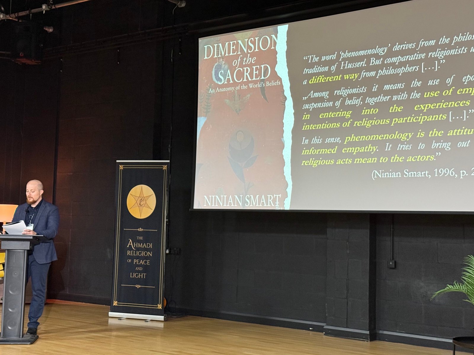 The author, Márk Nemes, speaking at an academic conference about the AROPL.