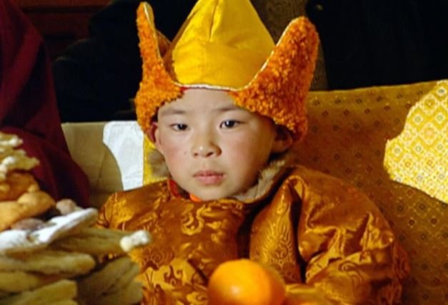 The false Panchen Lama shortly after his “enthronement” in 1995. Screenshot.