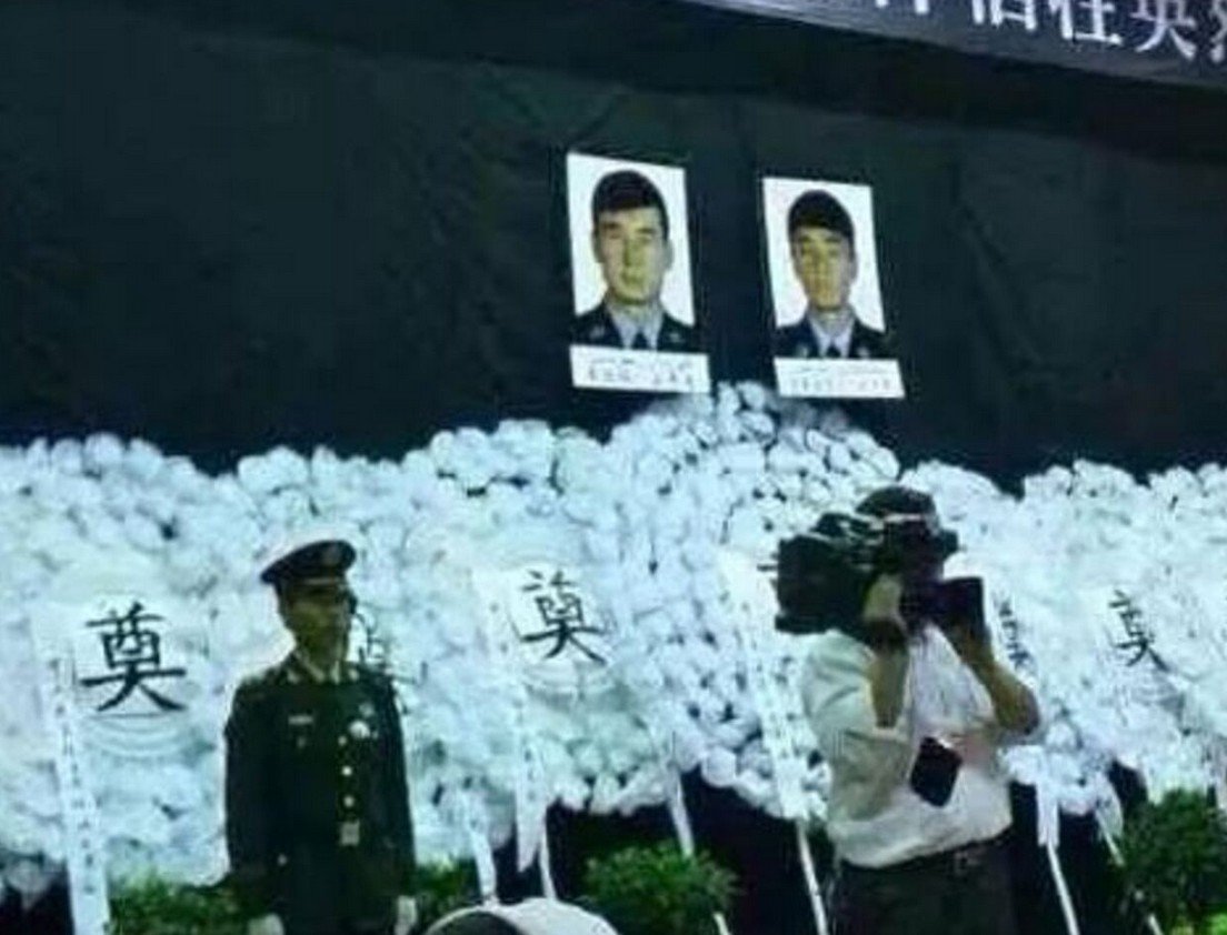 Mourning ceremony for Chinese officers stabbed to death at Sogan Coal Mine in 2015. From Weibo.
