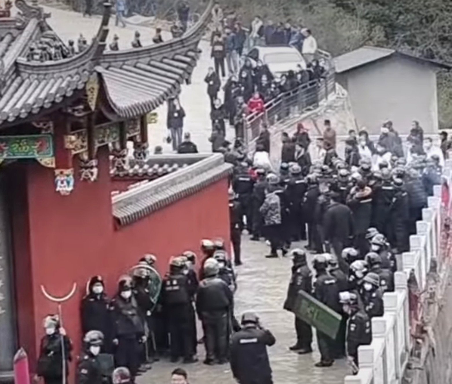 Police arrive at the temple site.