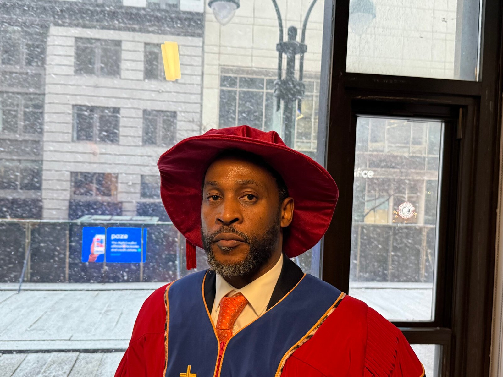 IMboni Radebe enjoying the New York snow after the Doctorate ceremony.