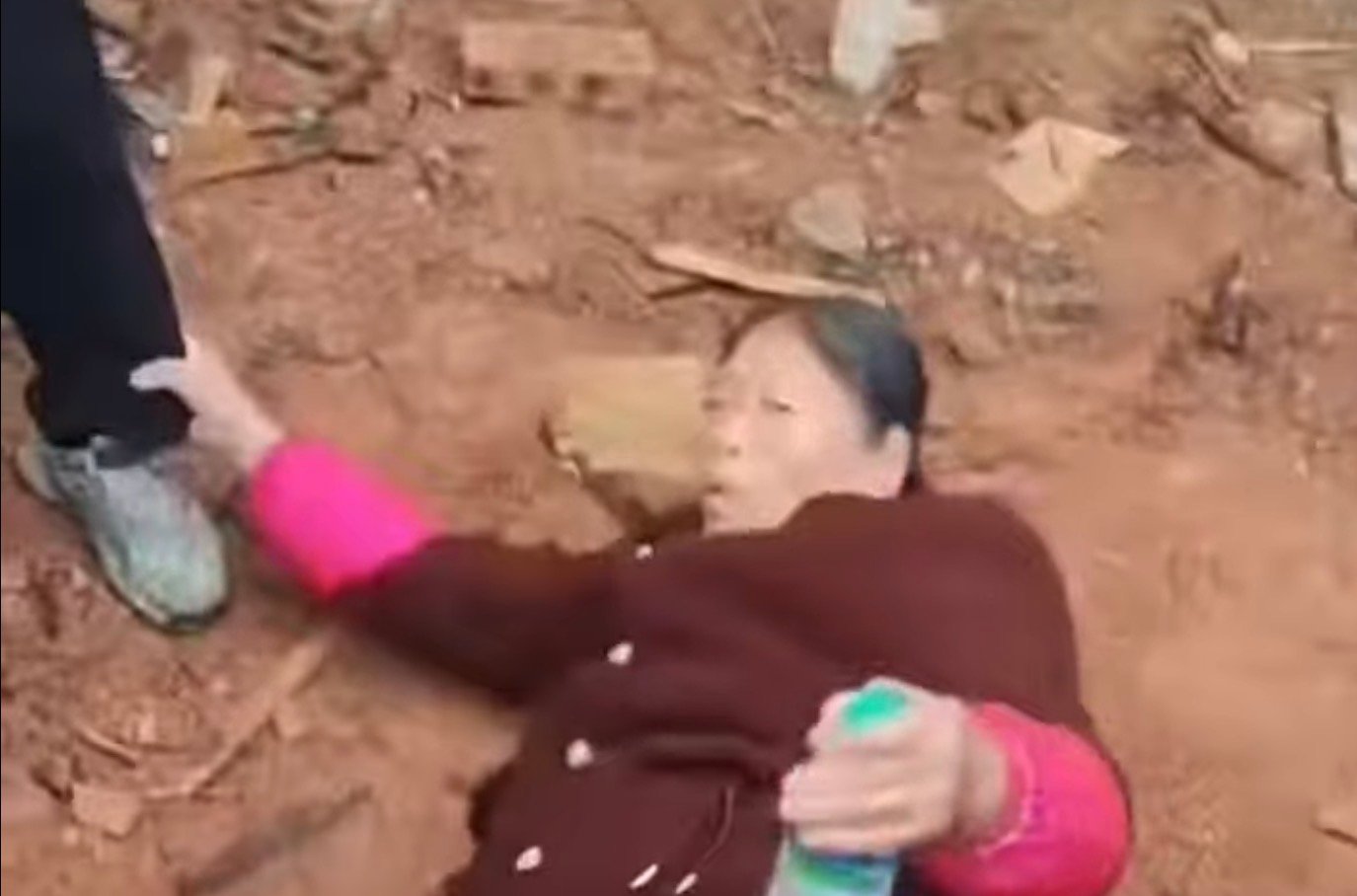 A woman was hit by the police in Qusha Village.