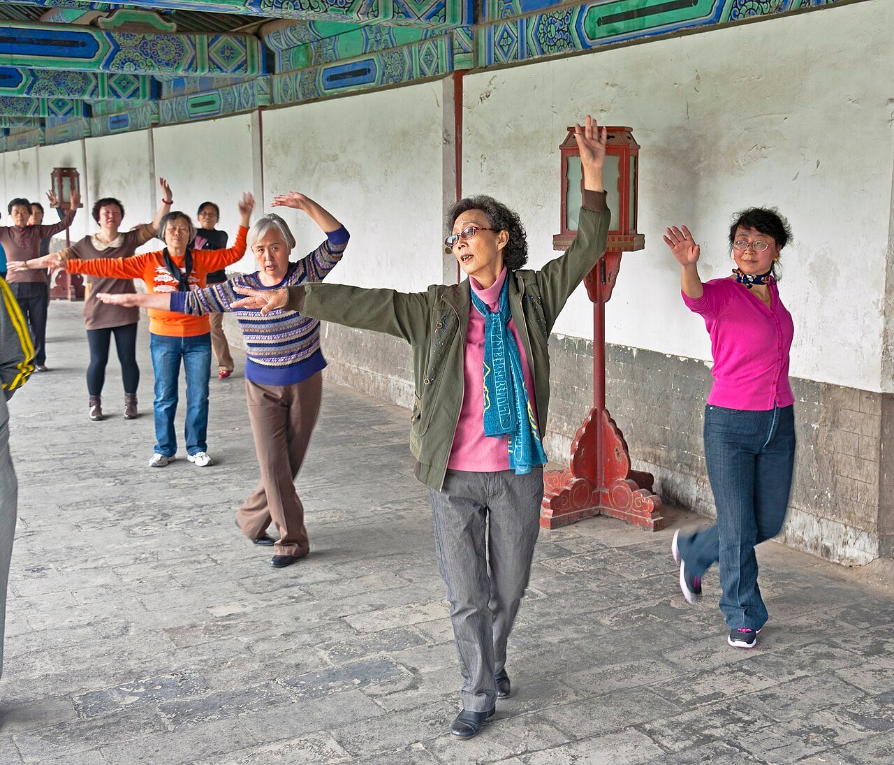 Female pensioners exercising in Temple of Heaven Park, Beijing. Credits.