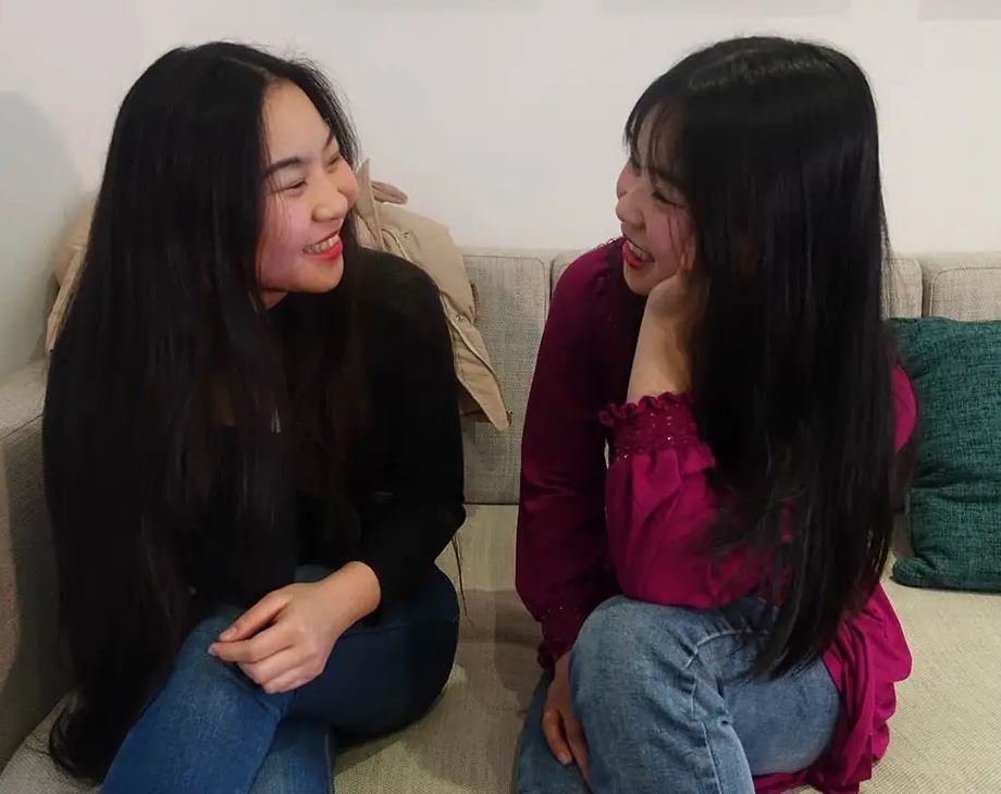 The twins, finally reunited at age 18. From X via Barbara Demick.