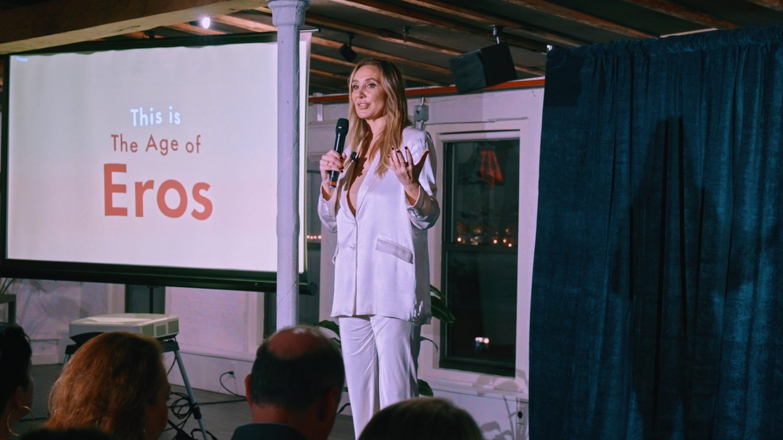 Nicole Daedone giving a lecture.