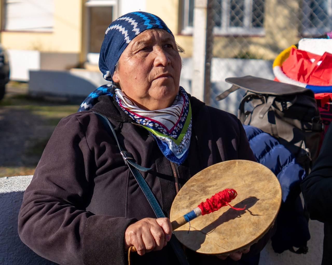 A supporter of Jones Huala protests outside Rawson Prison.