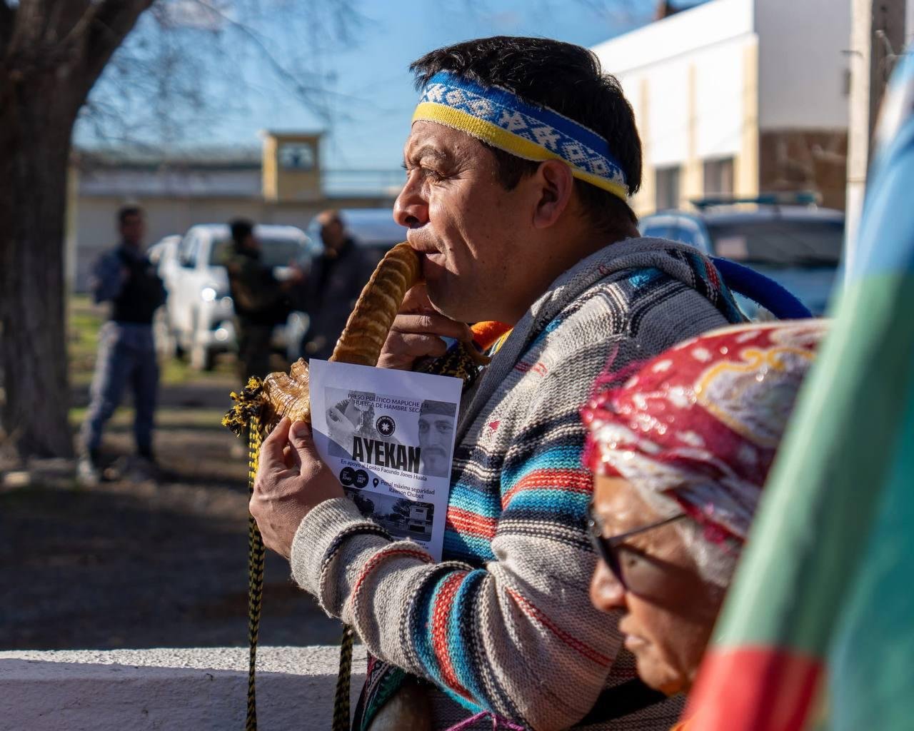 A Mapuche activist protesting outside Rawson Prison.