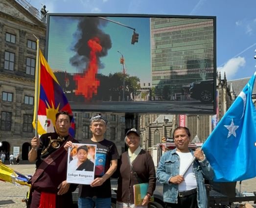 Uyghurs and Tibetans commemorate Lobga Rangzen in Amsterdam’s Dam Square.