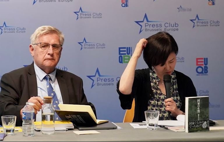 The author at the Brussels press conference with Willy Fautré, co-founder and director of Human Rights Without Frontiers, introducing her book “Sacrifice to the Nation.” Photo by FOREF.