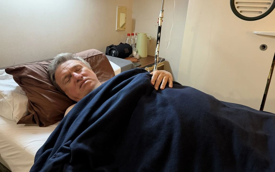 Rudnev in the Naval Hospital for his second surgery, July 2026.
