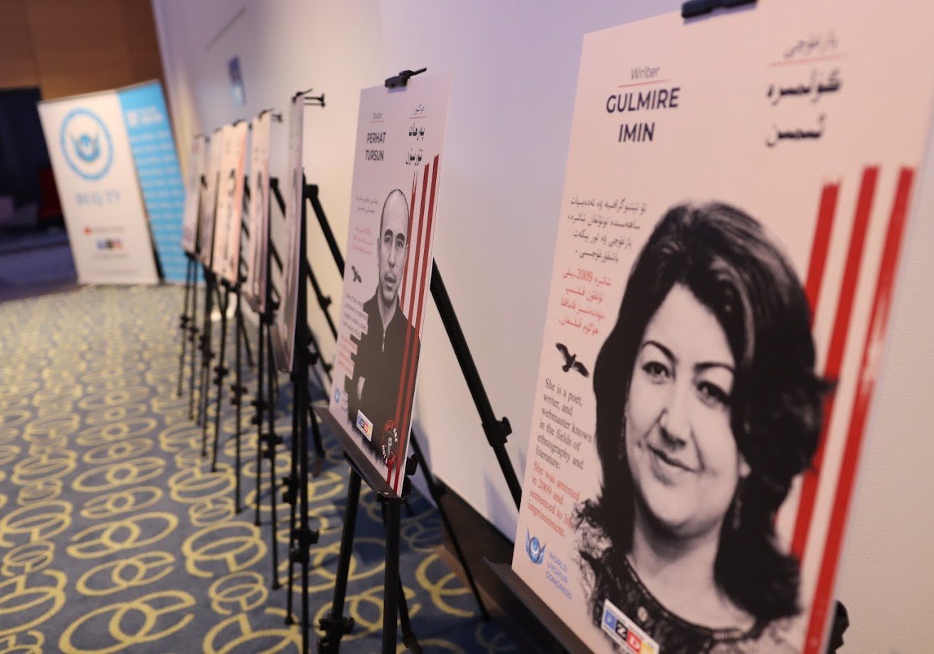 Posters about Uyghur prisoners of conscience at the Forum.