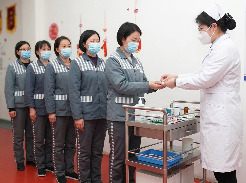 Inmates at Heilongjiang Women’s Prison in a Chinese propaganda video. Screenshot.
