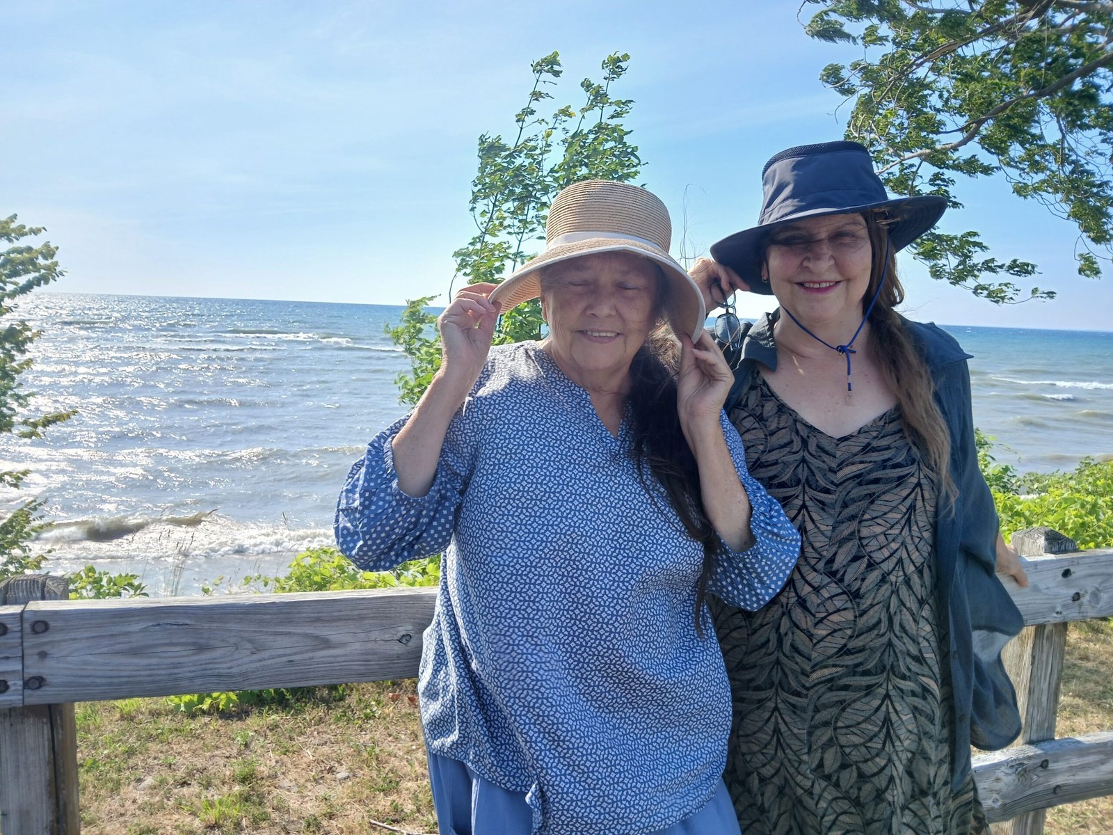 Susan Palmer with Twelve Tribes resident lawyer Jean Swantko Wiseman on the banks of Lake Erie.